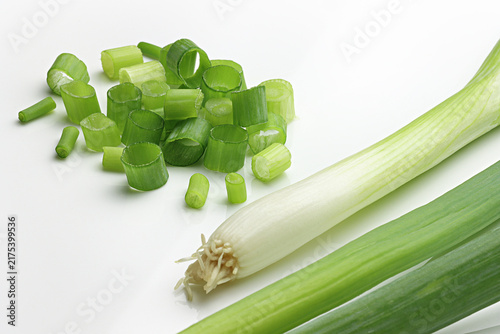 Konstfotografi Fresh Scallions assorted close up on white background