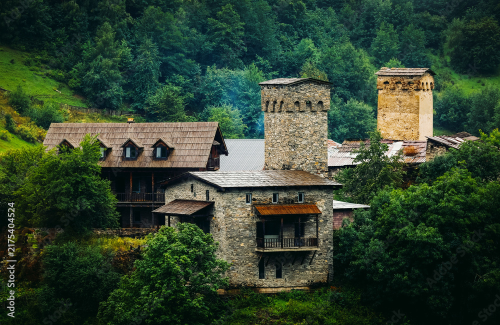 Obraz premium Scenic rainy landscape of Ushguli village with traditional Svan towers. Upper Svaneti, UNESCO world heritage in Georgia.