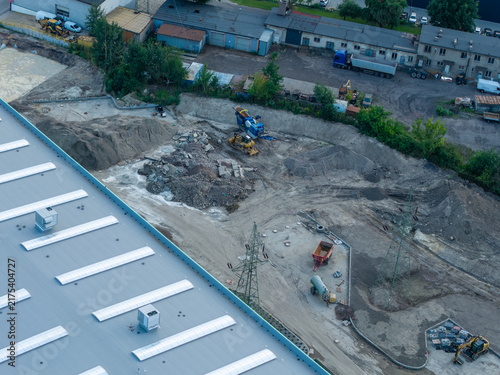 Photography Aerial view construction site developing industrial area with heavy machinery