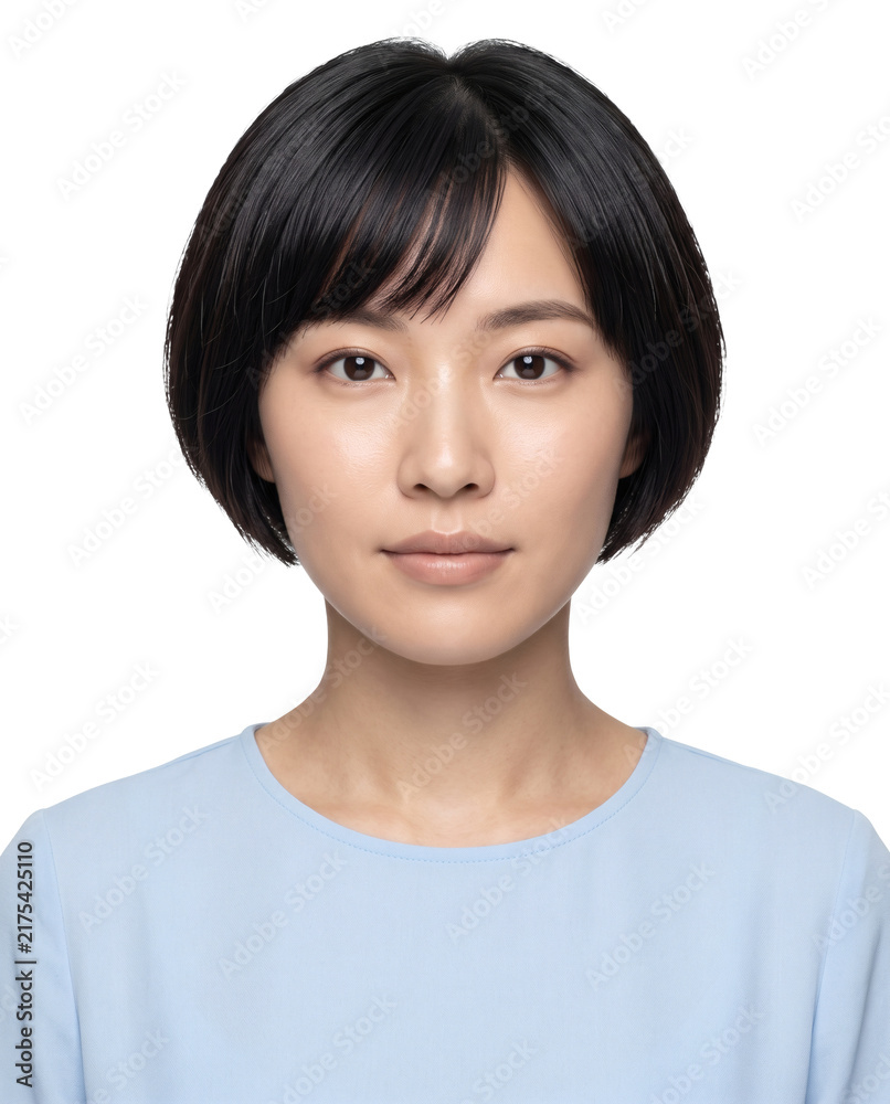 Fototapeta premium Asian woman with short black bob hairstyle in blue top, isolated on a transparent background for inclusive campaigns, professional branding, editorial layouts, website banners, and social media