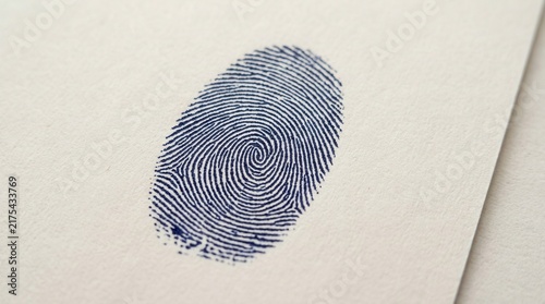 Plakat w ramie Distinctive Fingerprint Pattern On Textured Paper