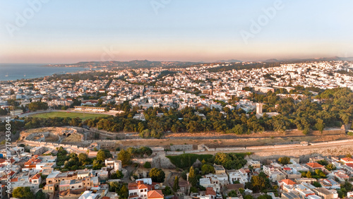 Fotografía Aerial panorama of Rhodes city with historic fortifications, sports stadium, coa