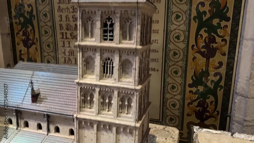 Detailed miniature model of St. Plechelmus Basilica tower inside the historic church in Oldenzaal, Netherlands.