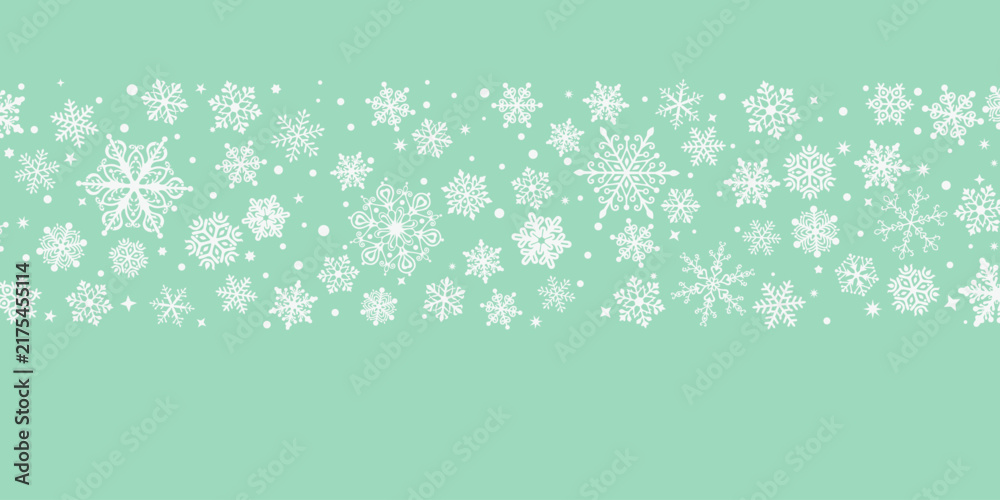 Fototapeta premium Light mint green Christmas background with delicate white snowflake illustrations creating a festive winter scene.