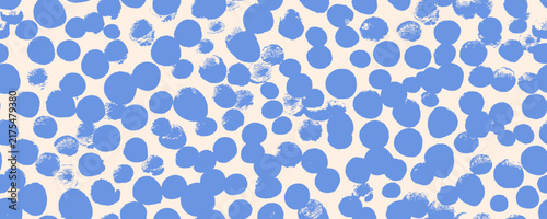 Blue polka dot seamless pattern with scattered bold brush circles. Childish nursery polka dot decor wallpaper, wrapping paper design for baby shower. Round confetti kids birthday seamless background.