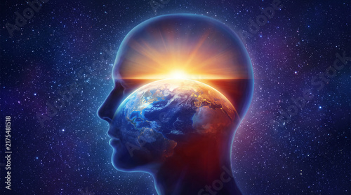 A conceptual digital illustration of a human head silhouette with the planet Earth and a sunrise inside, set against a vast starry galaxy background.
