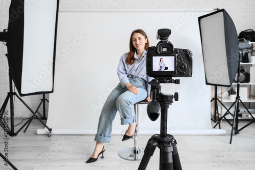Canvastavla Professional photography session, woman posing for portrait in studio with camer