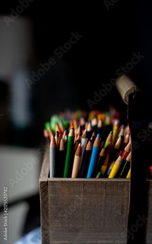 colored pencils in a box