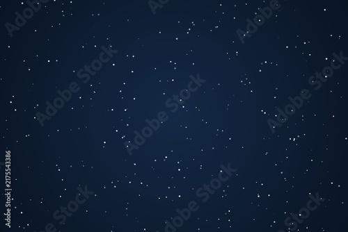 Starry night sky background with tiny white specks of distant bright stars.