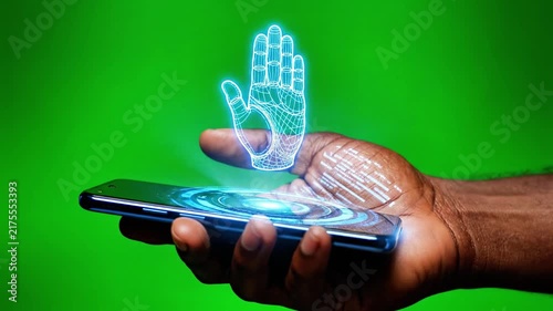 Hand holding phone with 3D wireframe holographic display.