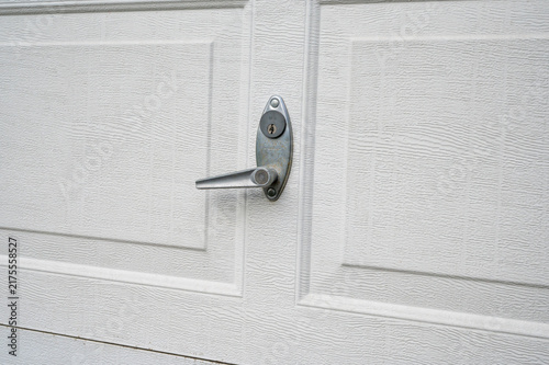 Konstfotografi Garage door lock and key cylinder close-up
