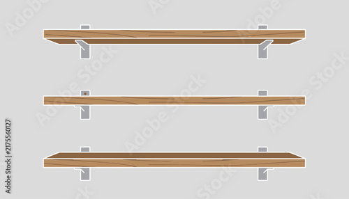 Three minimalist empty wooden wall shelves with silver metal mounting brackets displayed on a plain grey background.