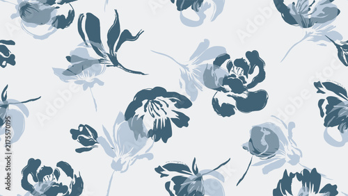 Floral seamless pattern features blue peony and magnolia flowers silhouettes on a light beige background. The flowers have a painterly, slightly abstract quality
