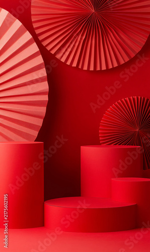 Red podium display with folded paper fans