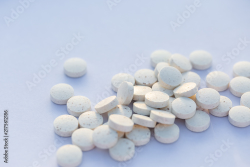 Zinc supplements in tablet form for general wellbeing on white