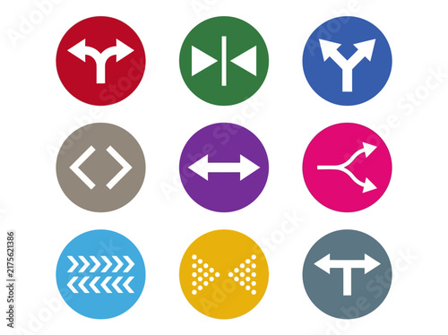 Set of Flat Directional Arrow Icons in Colorful Circles