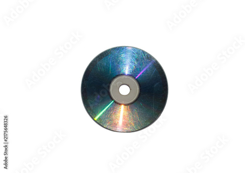 Obraz na plátně Bottom reflective surface of a heavily scratched compact disc aka CD or digital versatile disc aka DVD displaying a rainbow-like diffraction pattern and surface scuffs