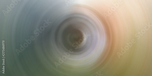 Quadro su tela Abstract blurry vortex with subtle gradient colors from grey to orange, creating a soft, mesmerizing background