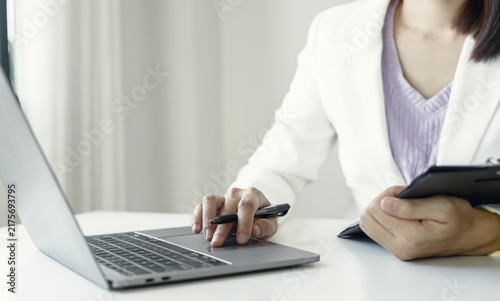Obraz na płótnie Businesswoman Reviewing Resumes for Recruitment and Hiring Candidates, Analyzing