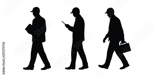 Silhouettes of three men in caps walking and working
