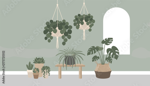 Beautiful indoor garden with various potted and hanging houseplants creating a fresh green oasis near a window.