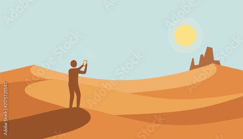 Silhouette of a person holding up a smartphone to catch a signal in the hot sandy desert dunes under a bright sun.