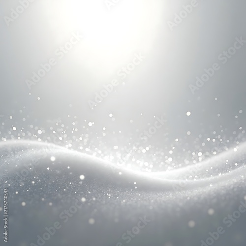 Soft focus glowing white snow drifts with sparkling particles and gentle light create magical winter background for holiday celebrations and design.