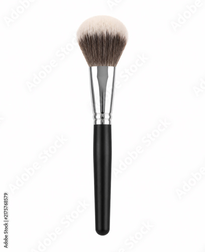 Makeup brush with dense bristles on white background