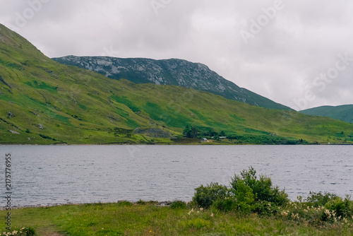 Fotografie Twelve Bens mountain range, a rugged chain of peaks rising above the scenic Connemara landscape in western Ireland - County Galway, Ireland - 31 August 2026