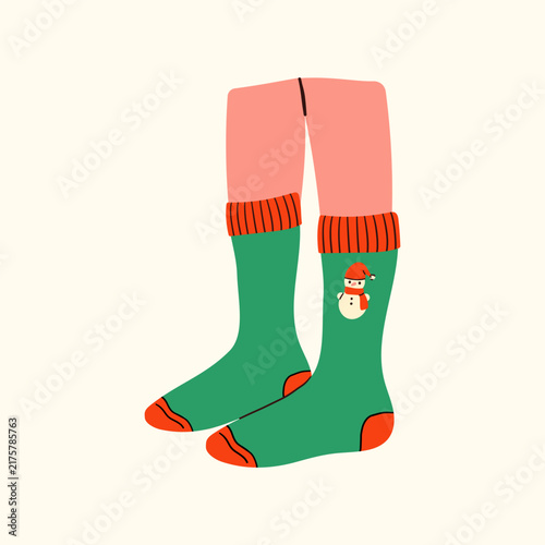 Cozy feet in warm woolen socks relaxing by a fireplace. Winter home comfort, hygge lifestyle, and seasonal relaxation concept. Soft knitted texture, warm aesthetic, and comfortable indoor mood.