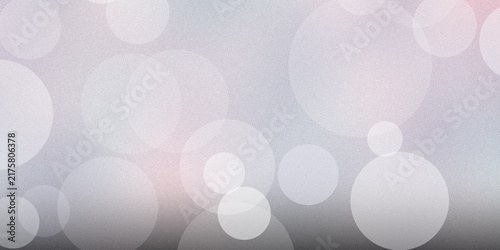 Minimalist white and silver bokeh abstract background with subtle light circles on grainy monochrome texture gradient.