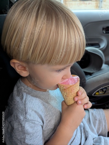 A three-year-old’s perfect summer escape: ice cream in the car. Messy, sweet, and wonderfully cool on a scorching day.

