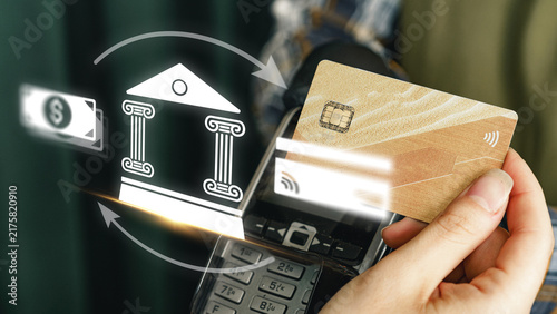 Quadro su tela Online payment process using a bank card and a mobile device at a retail locatio