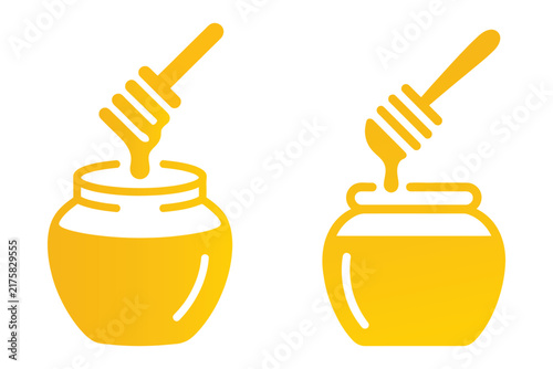 Honey pot and wooden dipper
