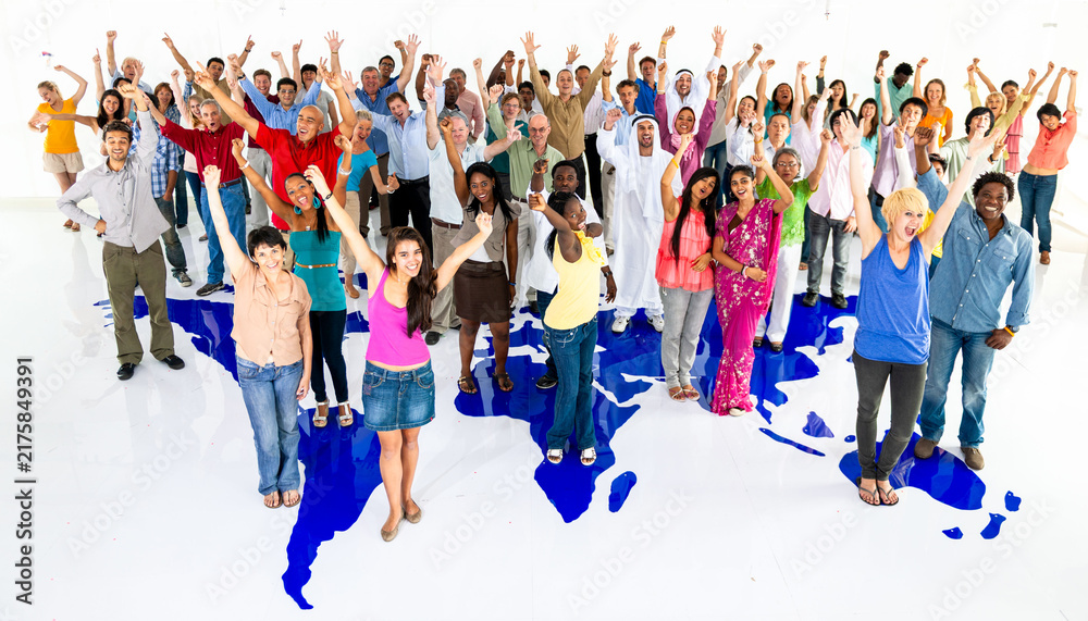 Fototapeta premium Diverse men and women standing over a world map, cheering together
