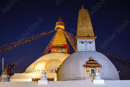 Nepal. Central. Kathmandu. Kathmandu Valley. Boudhanath. The Boudhanath stupa and a secondary stupa