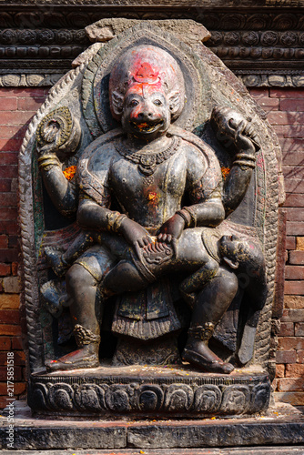 Nepal. Central. Kathmandu. Kathmandu Valley. A sculpture depicting Narasimha (the half-man, half-lion avatar of Vishnu) tearing the demon Hiranyakashipu apart whilst holding him on his lap