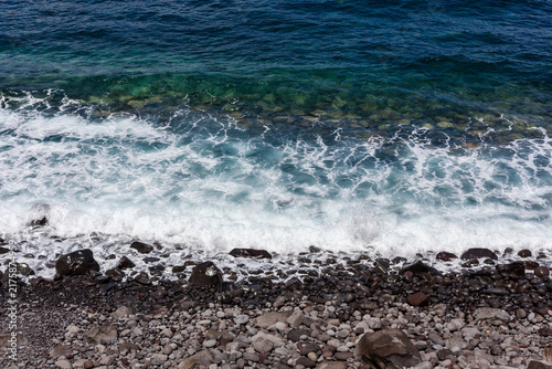 Картината върху платно Atlantic waves crash against Madeira's rocky coastline