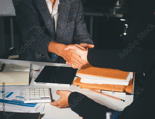 Konstfotografi Professional photo of a person's hands reviewing a contract or legal document on
