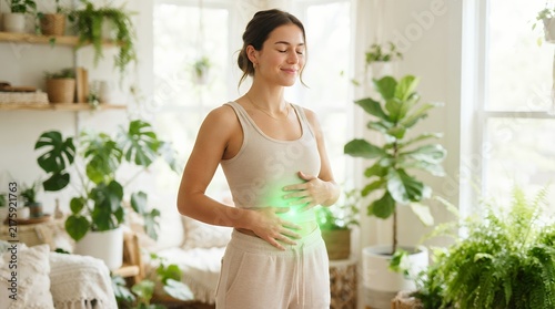 Serene woman practicing holistic wellness with glowing green energy in home interior.