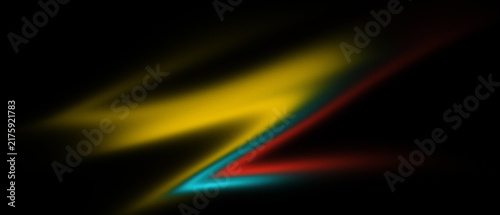 Canvastavla Abstract yellow blue red streaks against black background with soft focus