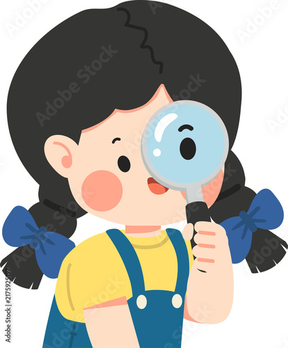 Young student using magnifying glass to explore
