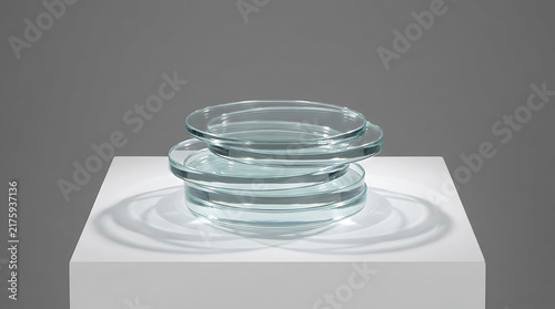 Petri Dish Stack: A precise stack of three sterile petri dishes, made of clear glass, sit atop a white pedestal, ready for laboratory use.