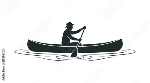 Silhouette of a person in a canoe, paddling on calm water, outdoors