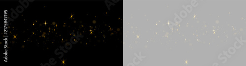 Fotografie A horizontal line of scattered golden starbursts shines against a pitch-black background