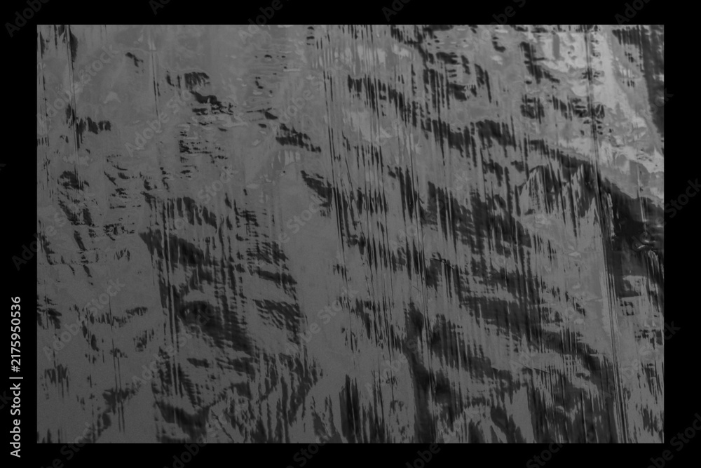Fototapeta premium Mockup frame overlay featuring black film texture, subtle noise and grain, with top lighting isolated on black