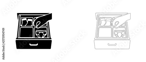 Hand organizing underwear in drawer organizer vector icon filled and outline, sock and garment divider box symbol.