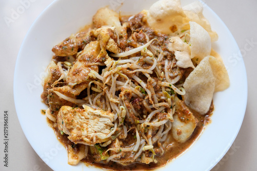 Canvastavla Traditional Indonesian kupat tahu, tofu and rice cake with peanut sauce and crac