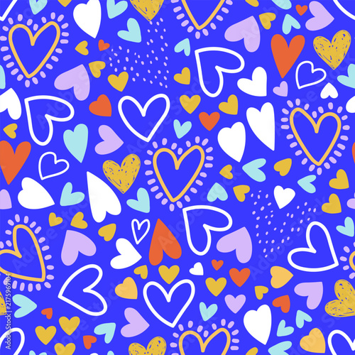 Colorful Hand Drawn Doodle Hearts Seamless Pattern on Vibrant Blue