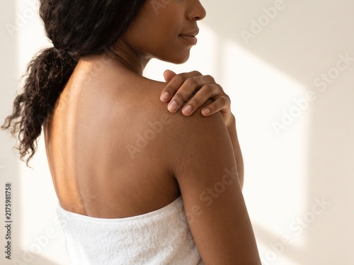 Beautiful Young Woman with clean, fresh skin. Facial treatment. Cosmetology, beauty, and spa. A nice and attractive girl with a pleasant smile.	